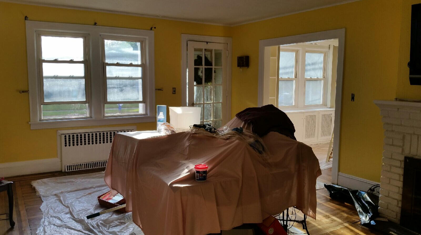 Den Room (AFTER) with Yellow walls &amp; White Boarders