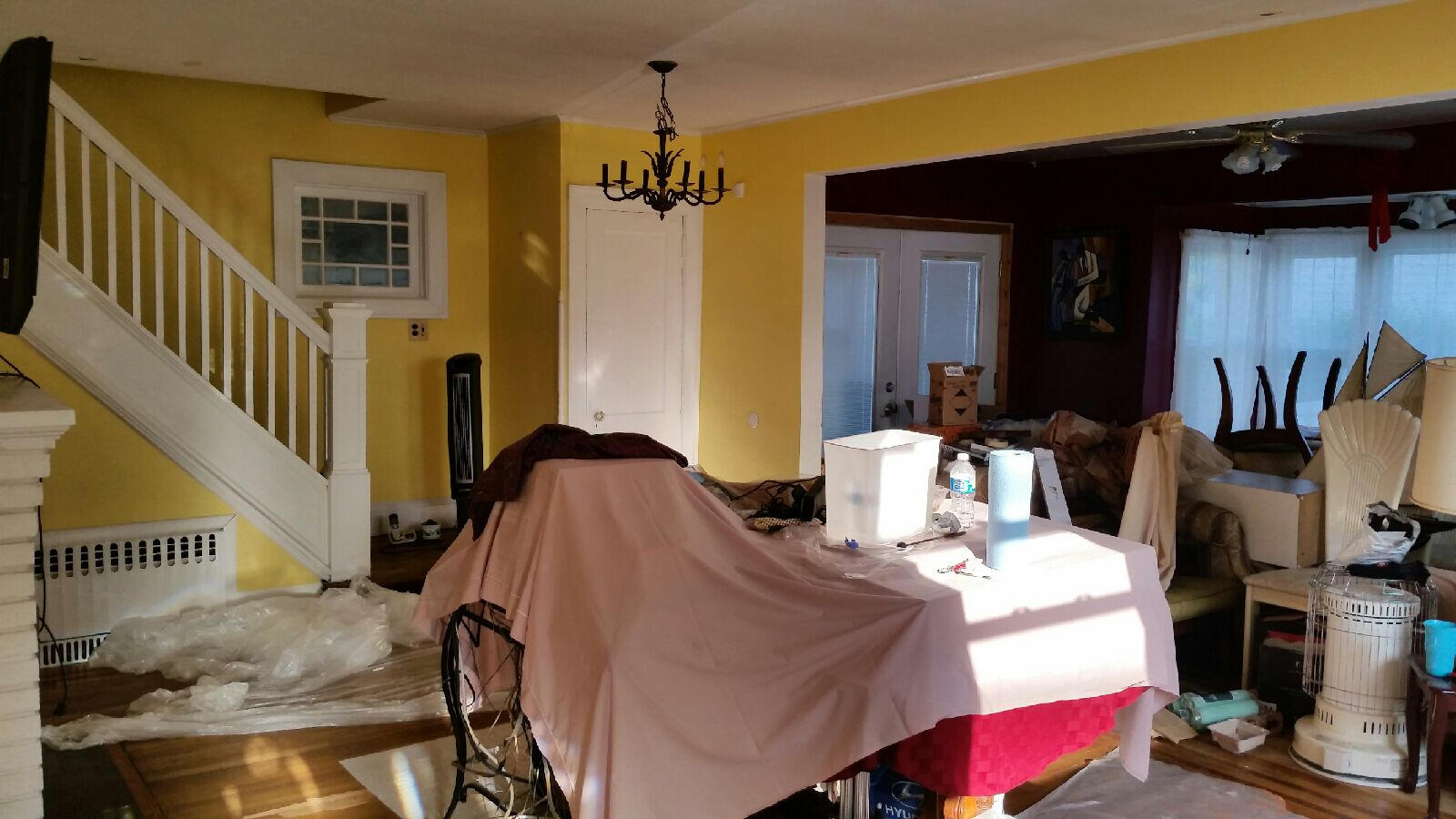 Den Room (AFTER) Yellow walls with White Stairs & Borders